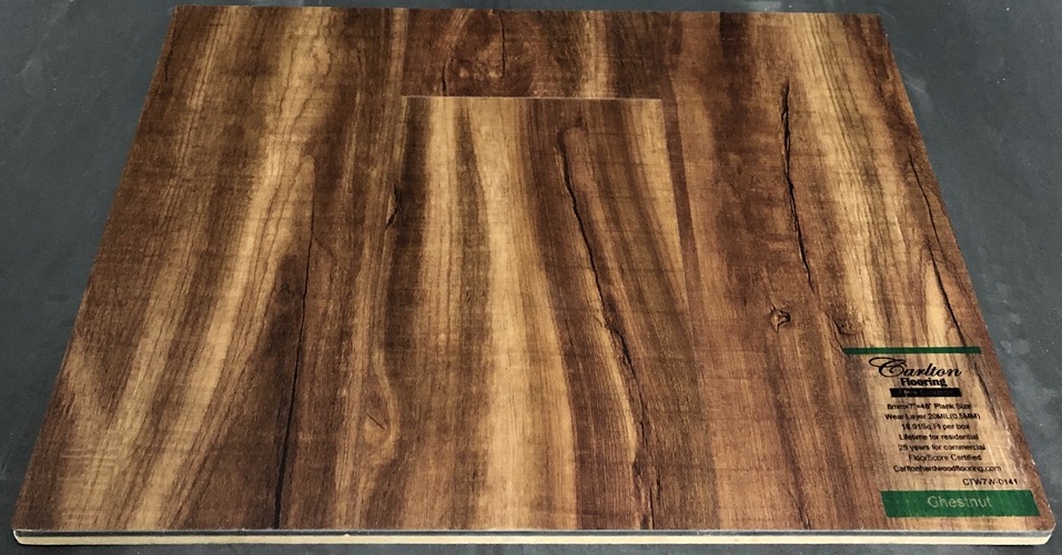 Carlton Flooring - Prime Collection Product: Chestnut Dimensions: 8mm x 7" x 48" (0.5mm Wear Layer) Underpad: Cork Attached Warranty: Lifetime Residential - 25 Years Commercial FloorScore Certified
