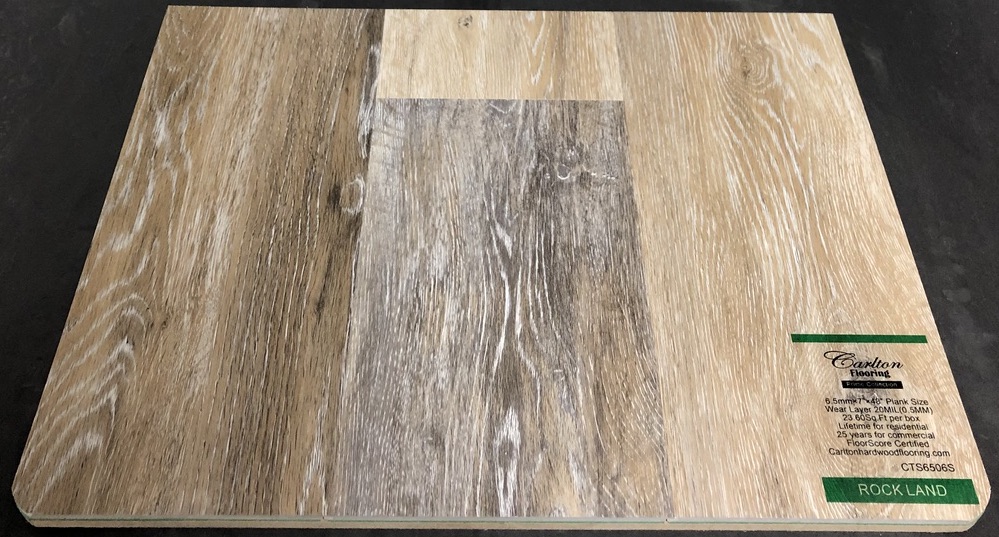 Carlton Flooring - Prime Collection Product: Rock Land Dimensions: 6.5mm x 7" x 48" (0.5mm Wear Layer) Underpad: Attached Warranty: Lifetime Residential - 25 Years Commercial FloorScore Certified Code: CTS6506S