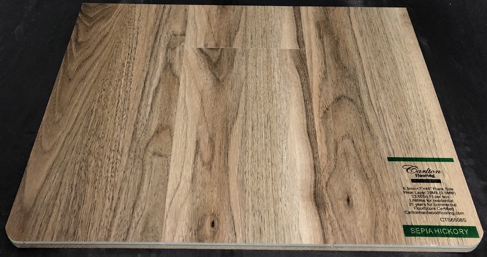 Carlton Flooring - Prime Collection Product: Sepia Hickory Dimensions: 6.5mm x 7" x 48" (0.5mm Wear Layer) Underpad: Attached Warranty: Lifetime Residential - 25 Years Commercial FloorScore Certified Code: CTS6508S