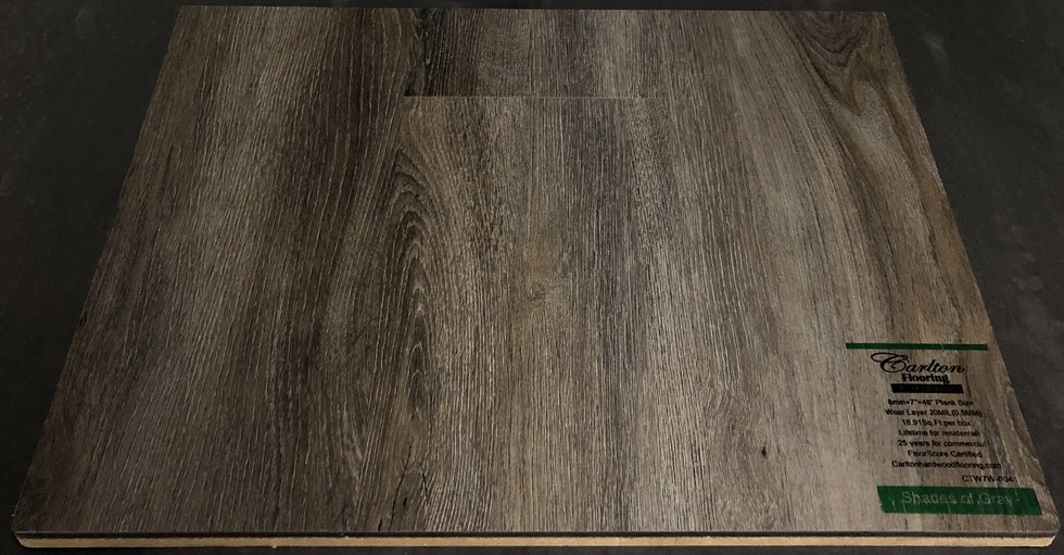 Carlton Flooring - Prime Collection Product: Shades of Grey Dimensions: 8mm x 7" x 48" (0.5mm Wear Layer) Underpad: Cork Attached Warranty: Lifetime Residential - 25 Years Commercial FloorScore Certified